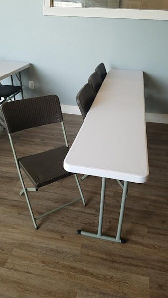Photo of Folding Tables and Chairs